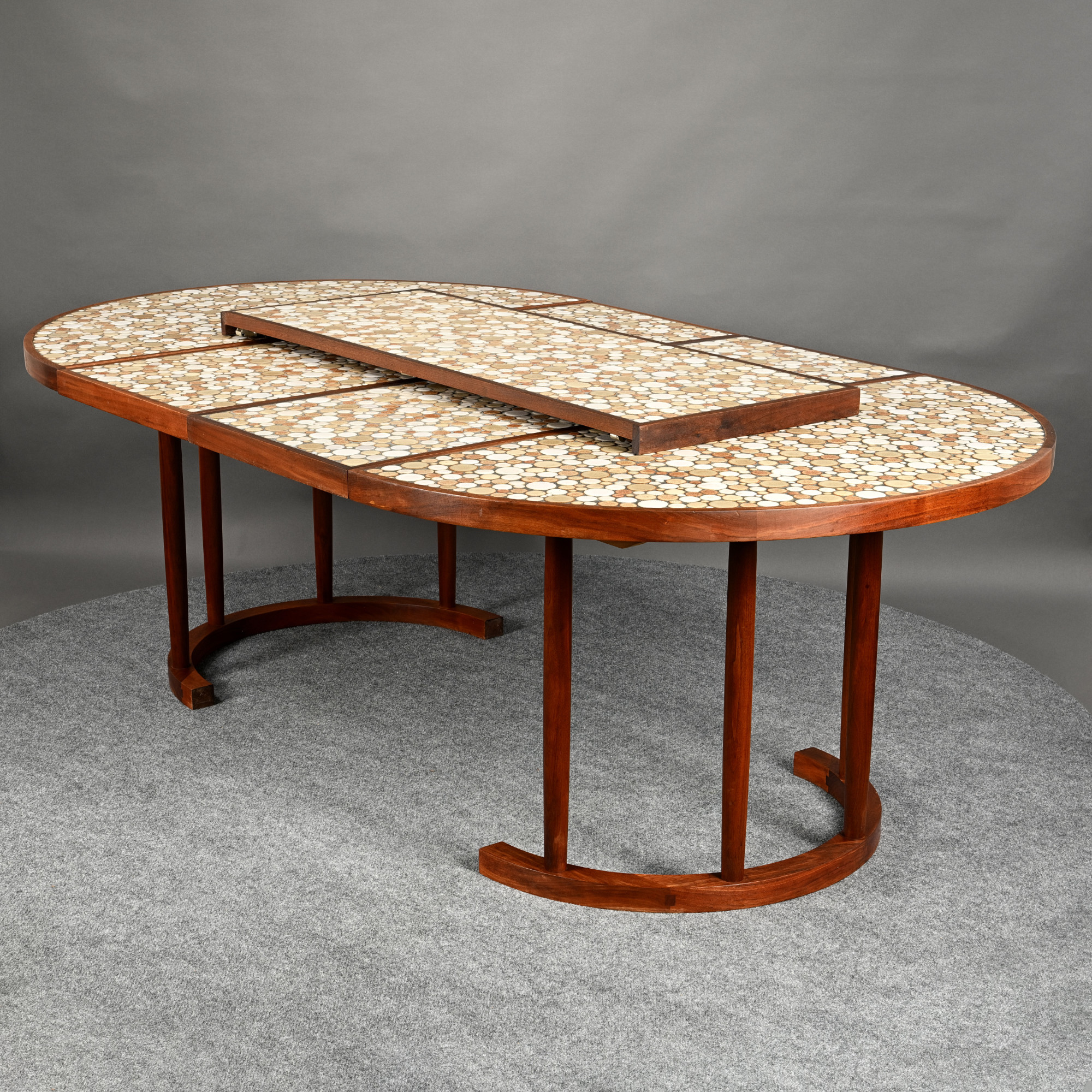 Gordon (1924-2015) and Jane (1929-2007) Martz for Marshall Studios Walnut and Ceramic Tile-Top Circular Extension Dining Table, Veedersburg, Indiana, 1951-1960s